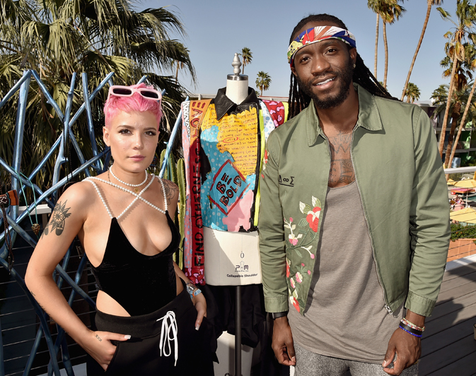PALM SPRINGS, CA - APRIL 13:  Singer Halsey (L) and artist Ron Bass celebrate Three Olives® Vodka Find Otherness, Thursday, April 13, 2017 at The Saguaro hotel, Palm Springs.  (Photo by David Crotty/WireImage)